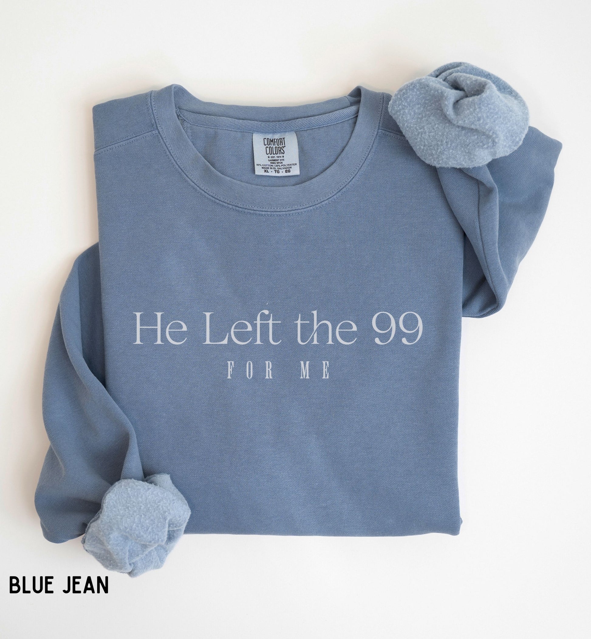 a blue sweatshirt with the words he left the 99 for me on it