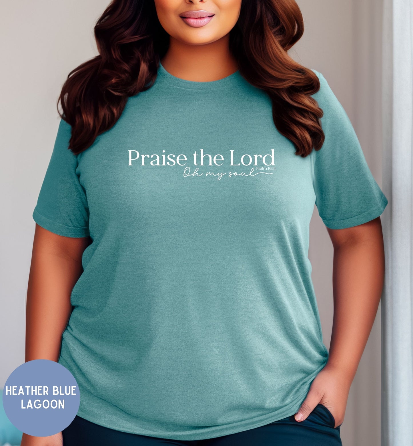 a woman wearing a blue shirt that says praise the lord