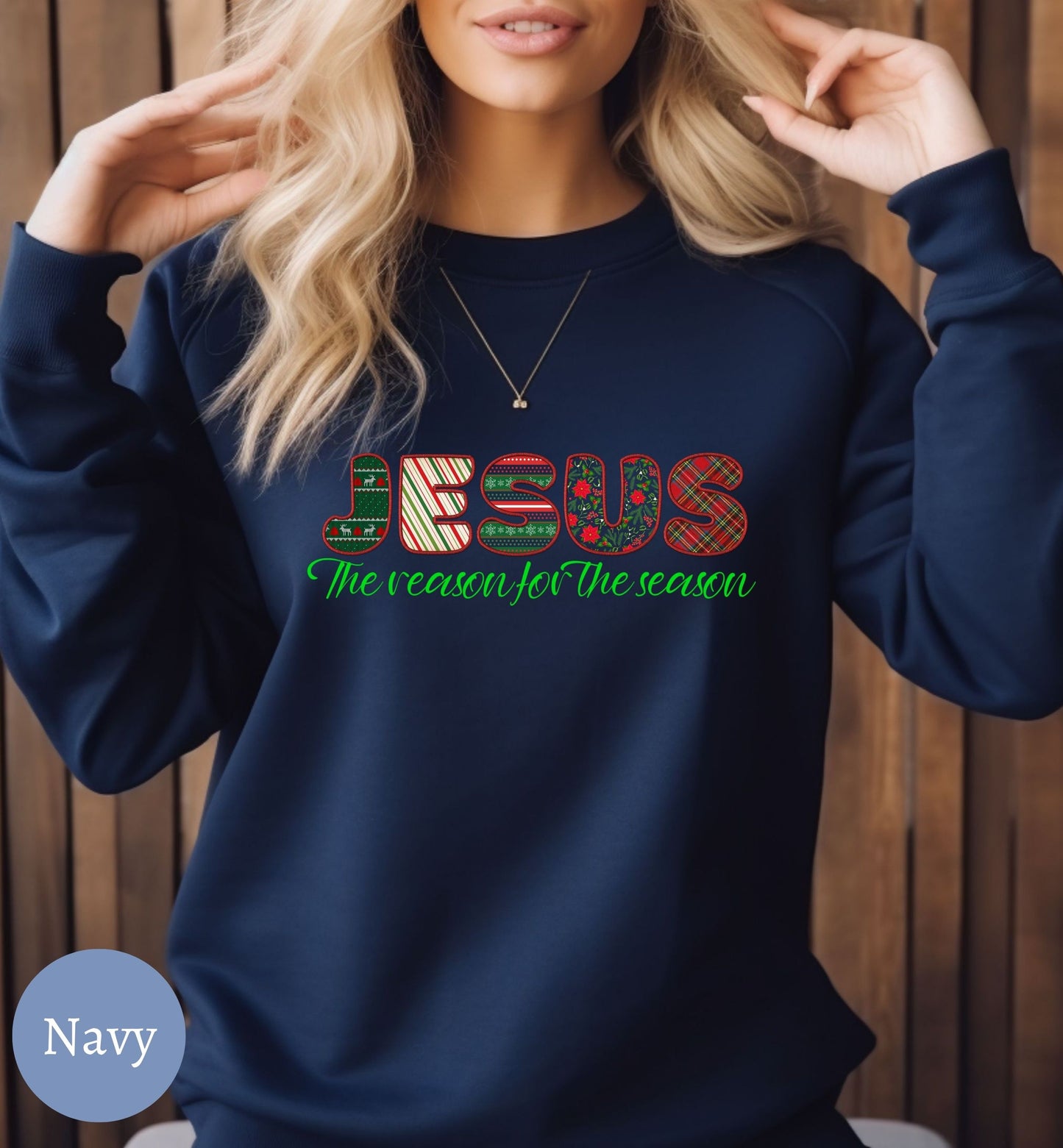 a woman wearing a sweatshirt that says jesus the queen of the ocean