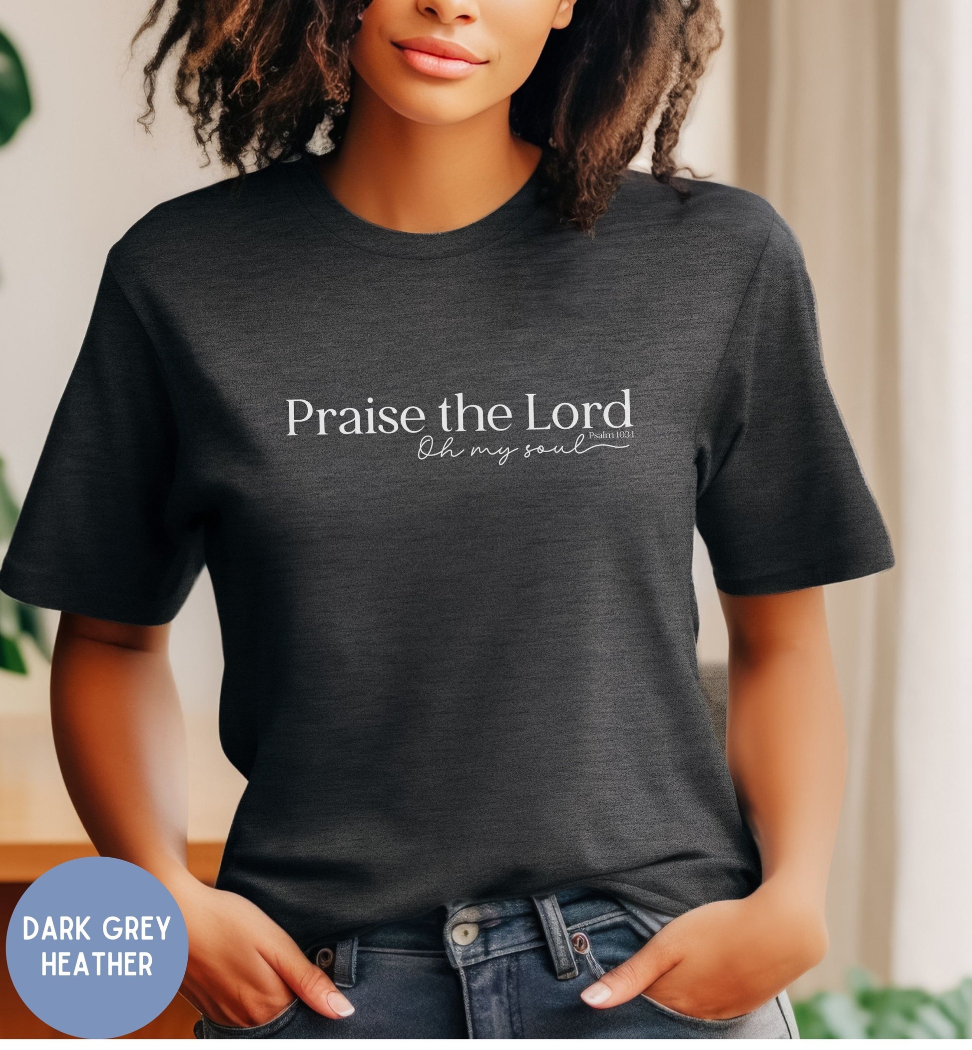 a woman wearing a t - shirt that says praise the lord