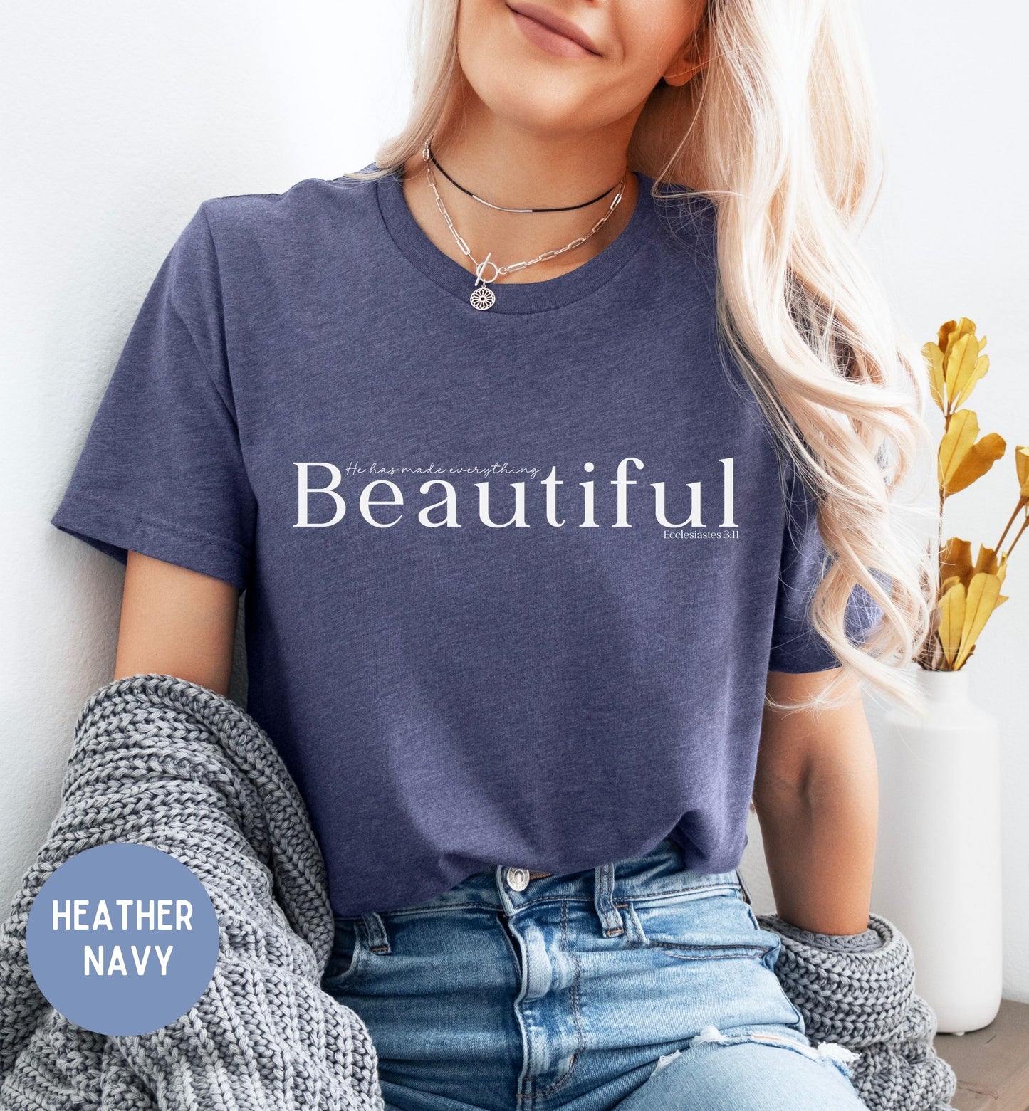 a woman wearing a t - shirt that says beautiful