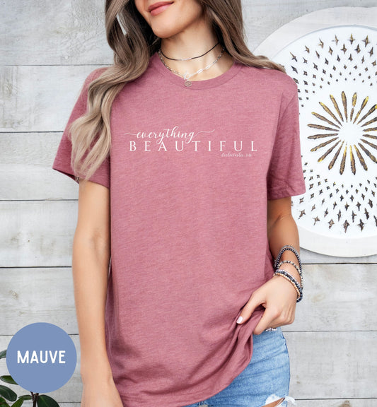 a woman wearing a t - shirt with the words beautiful on it