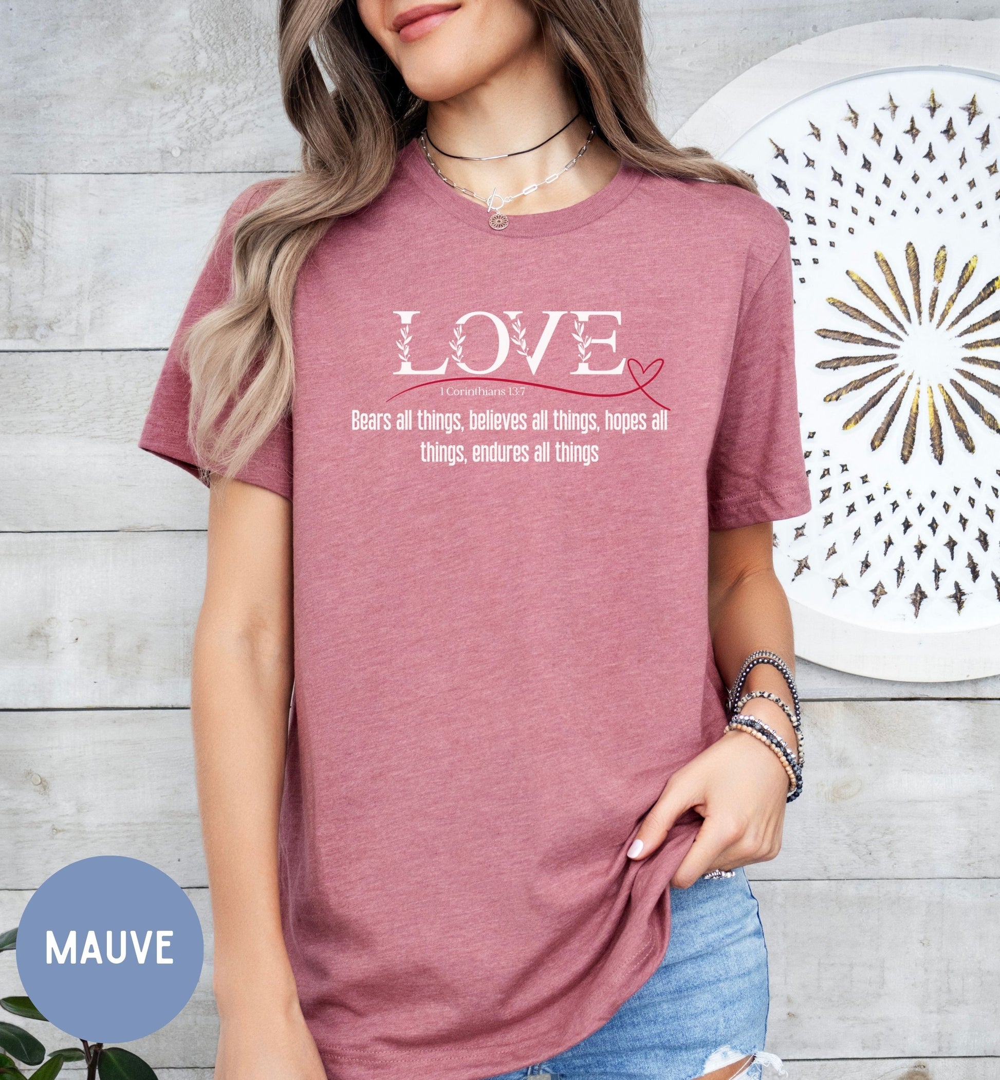 a woman wearing a t - shirt that says love