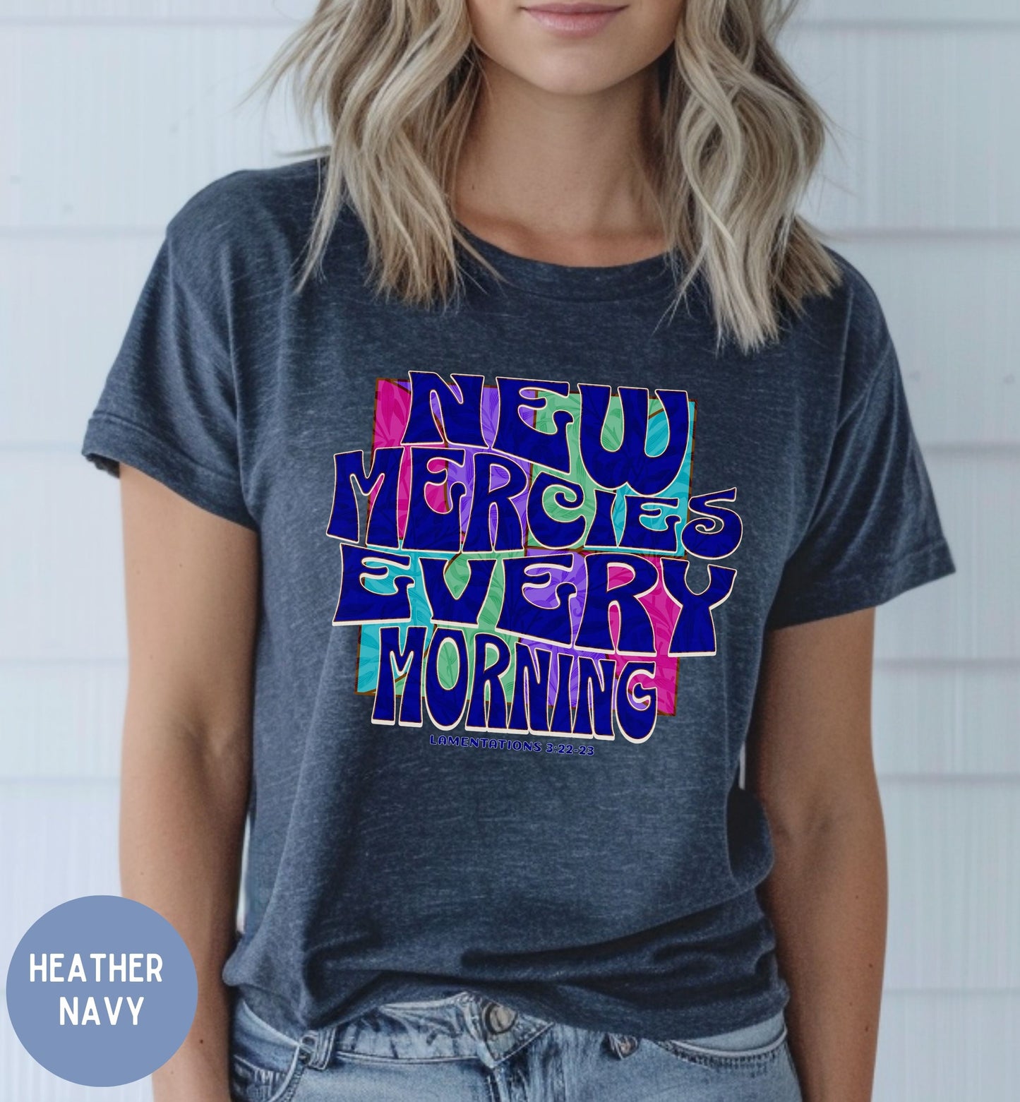 a woman wearing a t - shirt that says new merricks every morning