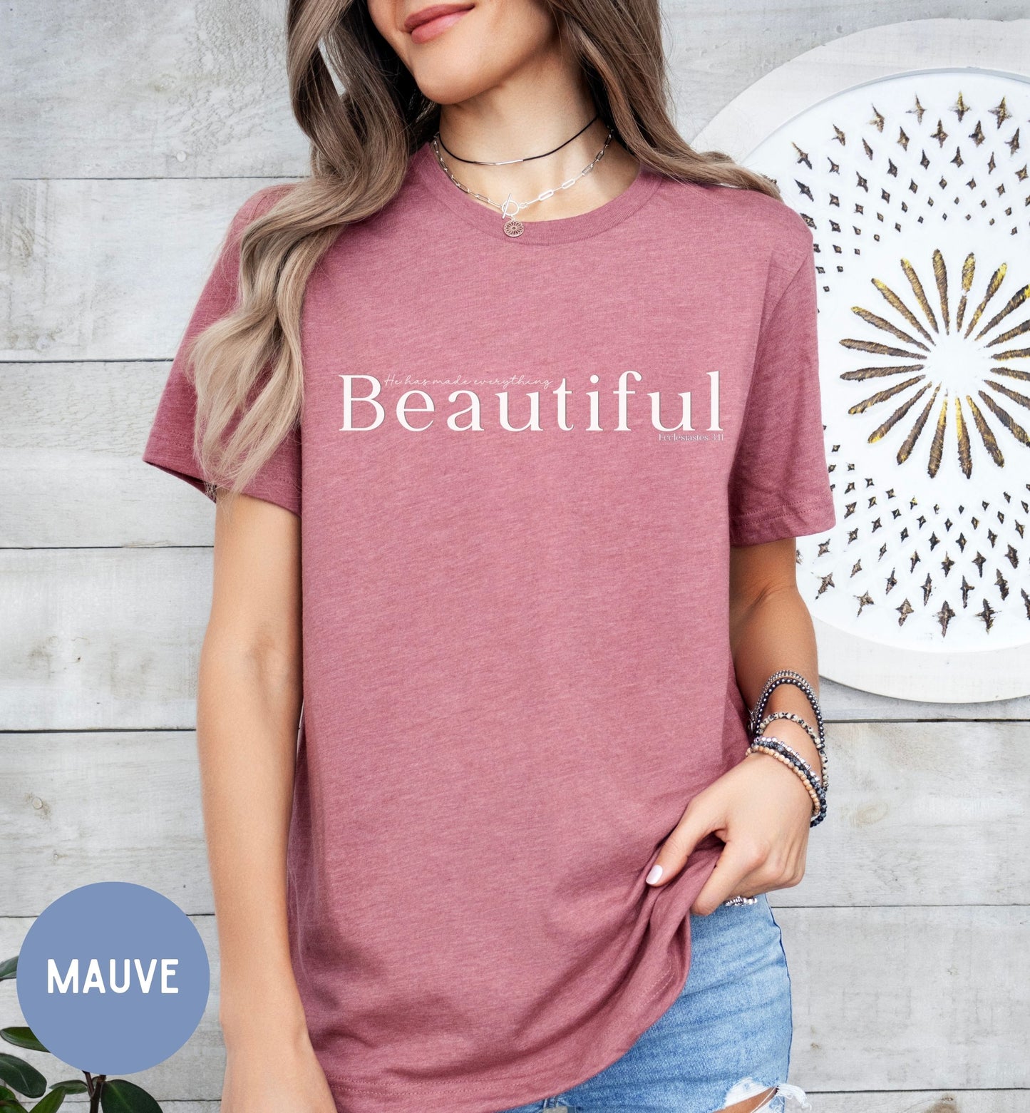 a woman wearing a t - shirt that says beautiful