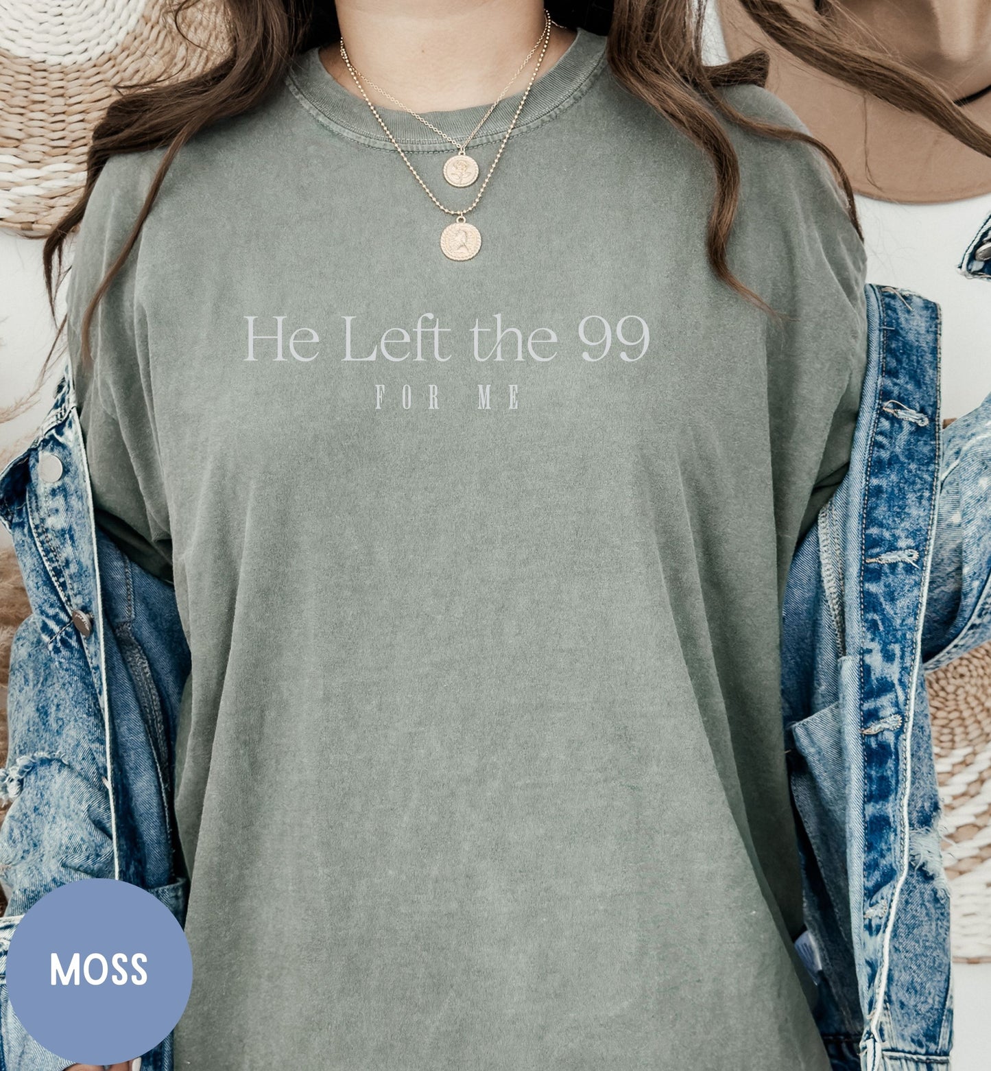 a woman wearing a t - shirt with the words he left the 99 on it