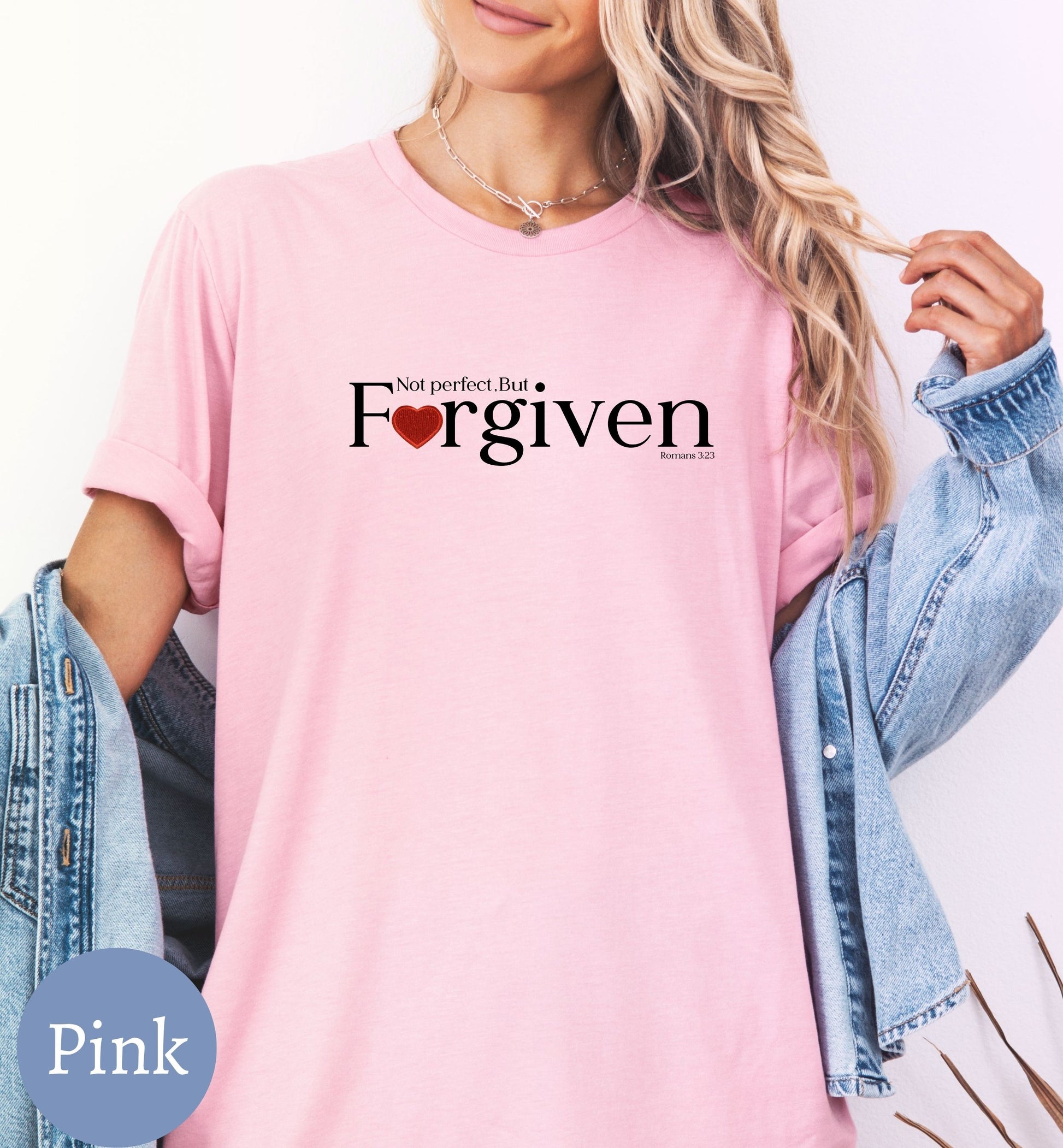 a woman wearing a pink t - shirt with the word, i love you,