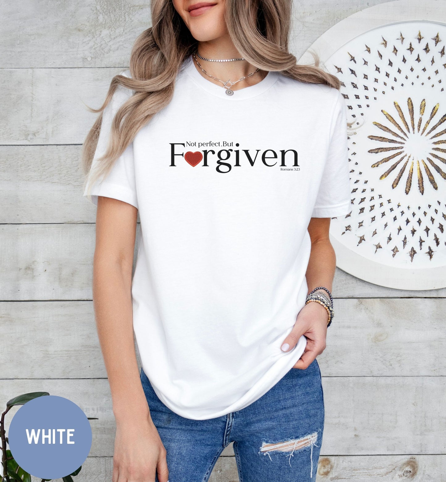 a woman wearing a white t - shirt with the word, i love you,